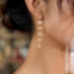 縮圖：Woman wearing stainless steel colorful zircon tassel earrings
