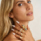 Model wearing cat eye stone rings